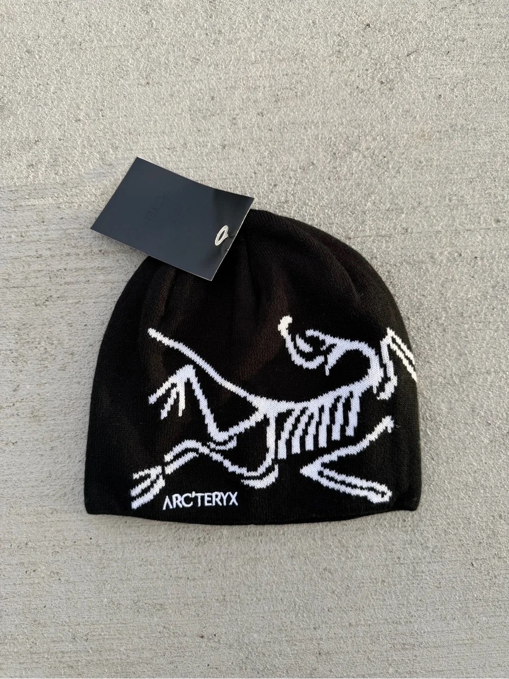 Black and white Arcteryx beanie